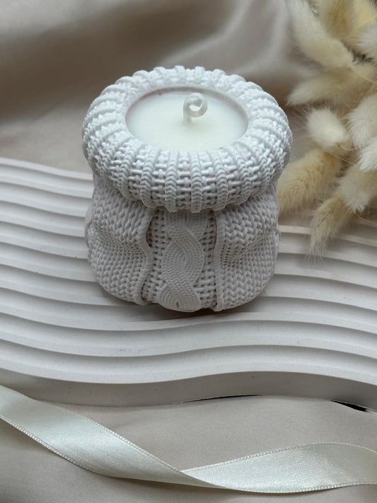 Bougie en tricot douillet